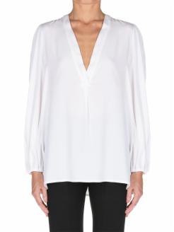 satin blouse, with long sleeves and V-neckline.